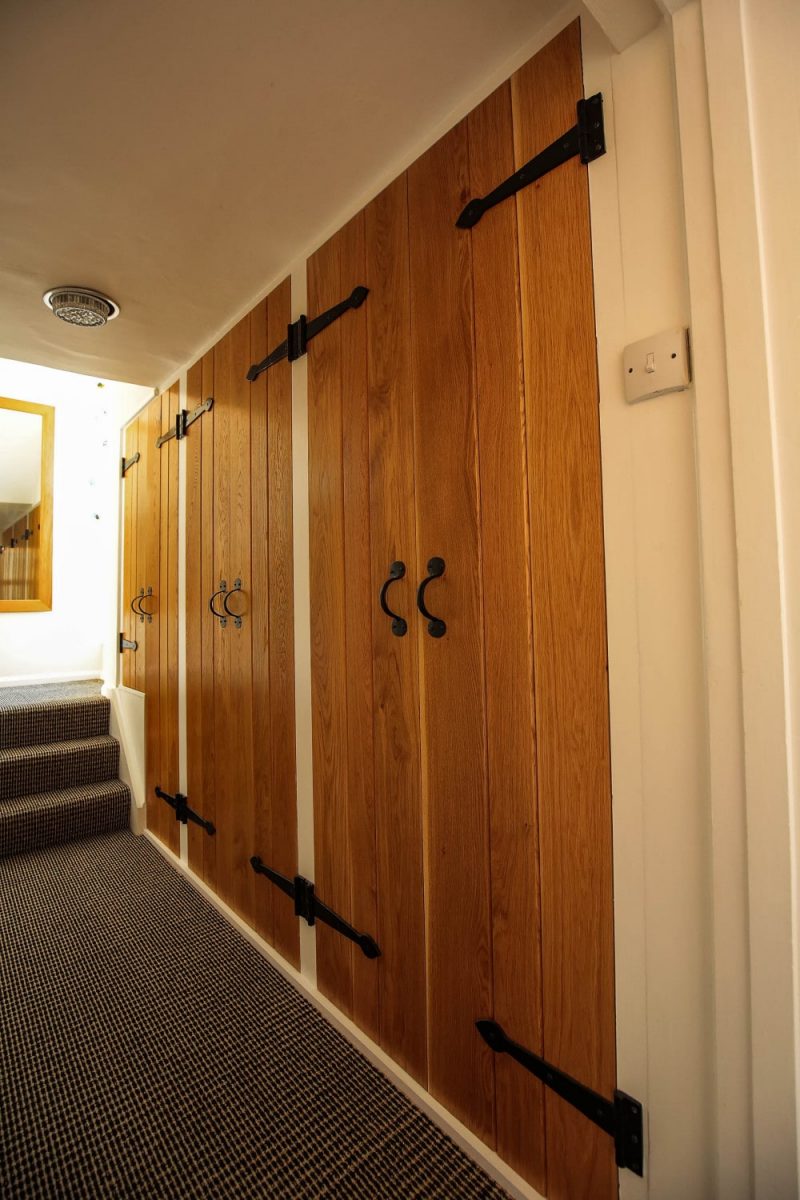 Oak ledged and braced shoe storage cabinets, Waterhall Joinery Ltd